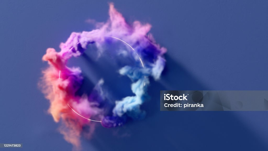 Circle of smoke Colorful smoke flowing around a glowing ring Creativity Stock Photo