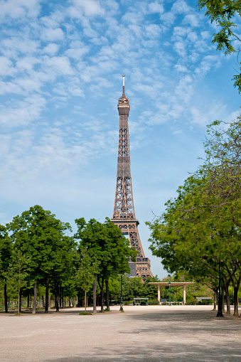 Eiffel Tower and Champ de Mars are empty during pandemic Covid 19 in Europe. There are no people, no tourists because people must stay at home and be confine. Schools, restaurants, stores, museums... are closed. April 27, 2020.