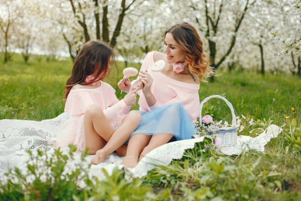 istock Cute and stylish family in a spring park 1221477638