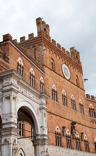 Tower of Palazzo Pubblico in Siena, a medieval city in Tuscany region of Central Italy.