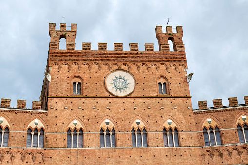 Tower of Palazzo Pubblico in Siena, a medieval city in Tuscany region of Central Italy.