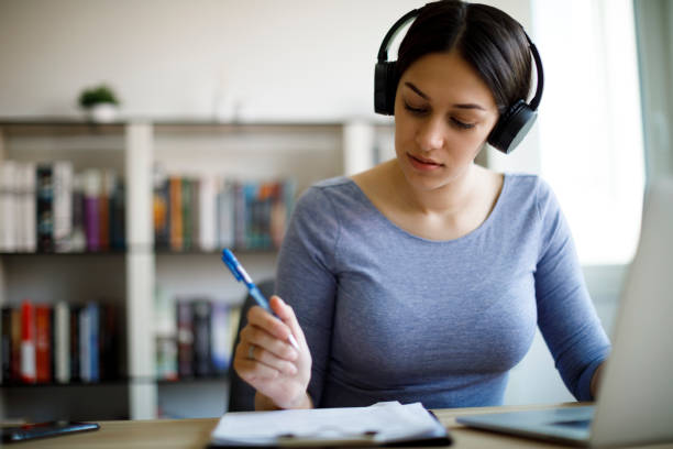 istock Young woman working from home 1221478495