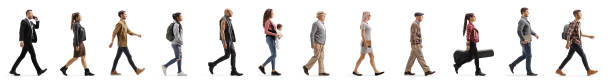 istock Long line of different profile people walking 1221478526