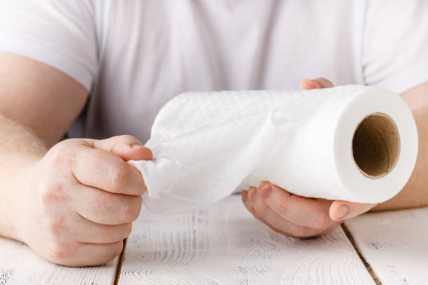 istock hands is holding kitchen roll of paper towel 1221478699