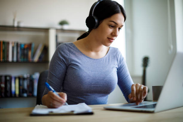 istock Young woman working from home 1221478714