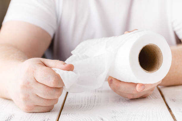 istock hands is holding kitchen roll of paper towel 1221479416