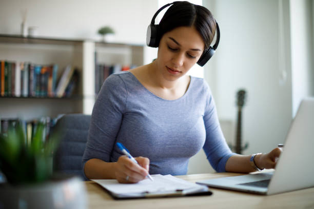 istock Young woman working from home 1221479534