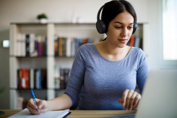 istock Young woman working from home 1221479624