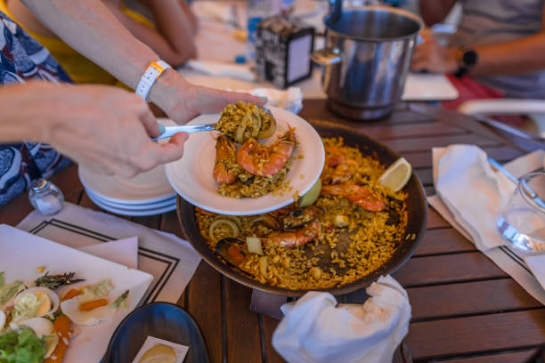 istock Paella at seaside in Spain 1221481379