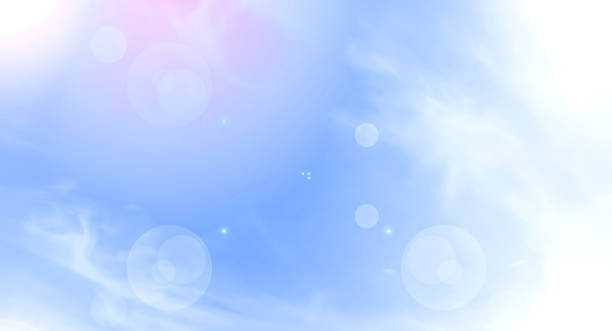 istock white clouds on a background of blue sky, abstract background. 1221481517