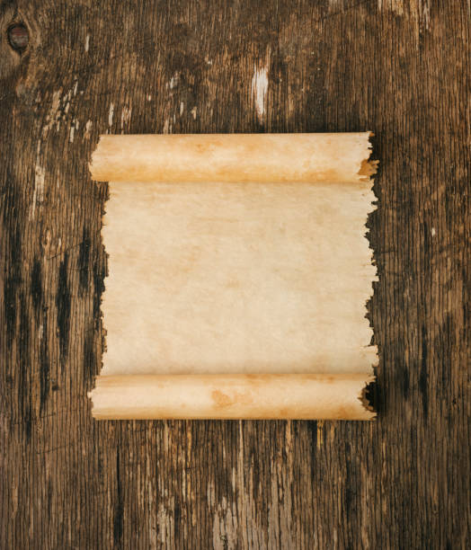 istock Old paper on the wood background 1221484774