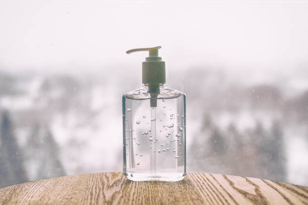 istock Corona virus hand sanitiser bottle for COVID-19 Coronavirus hands sanitizing sanitizer alcohol gel rub 1221486024