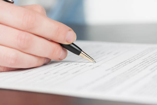 istock Business woman signing contract 1221487672