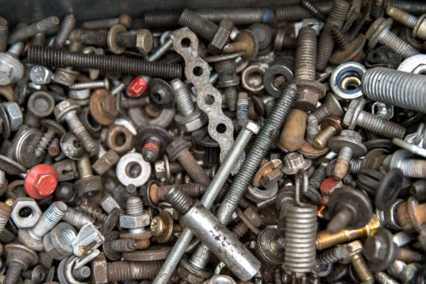 istock mix of bolts and nuts in a box 1221489824