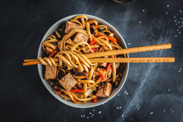 Asian noodles with cheese tofu stock photo