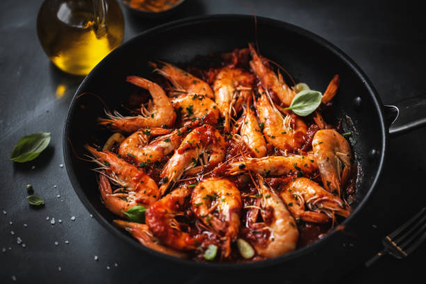 istock Fried shrimps with spices on pan 1221489975