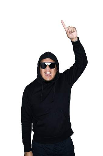Bearded asian men dressed in black hoody is showing point finger in white background.The concept of protest, attention, request. Place for text or copy space. Clipping path.