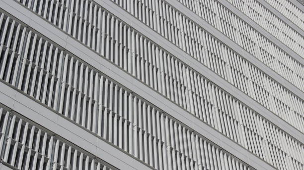 istock Windows, layed out on a grid pattern, part of a new steel building (Scientific Pole, Buenos Aires) 1221495442