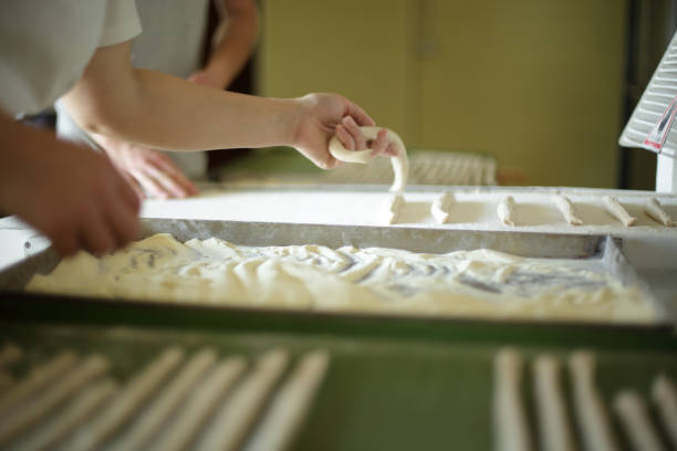 istock Making organic artisanal breadsticks by hand in Italy 1221497505