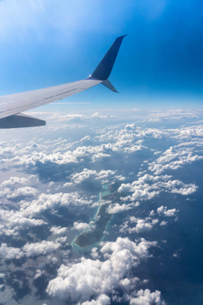 istock Small island seen from the window of a plane 1221497854