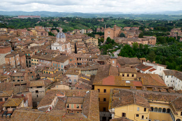 Siena, in the heart of Tuscany, Italy, is famed for its medieval beauty, the Palio di Siena horse race, and its culinary delights. It's a city rich in history and culture amidst the picturesque Tuscan countryside.