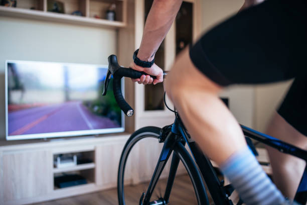 istock Unrecognizable Man Cycling At Home. 1221501005