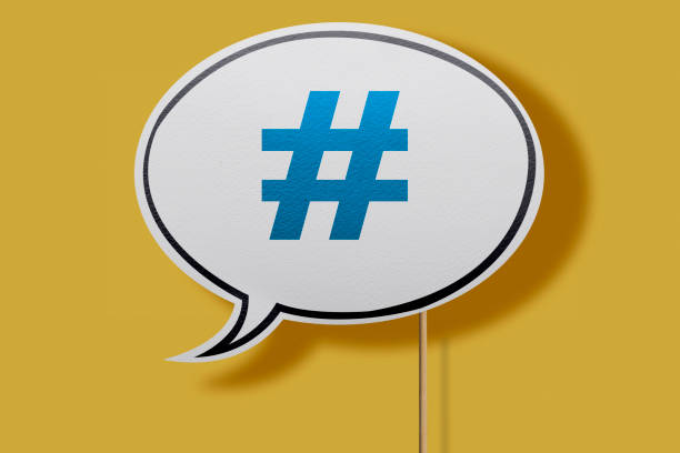 istock White, Rounded Chat Bubble With Hashtag Symbol On Yellow Background with clipping path. 1221502464