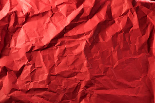 istock Texture of crumpled red paper. Creative vintage for design background. 1221504026
