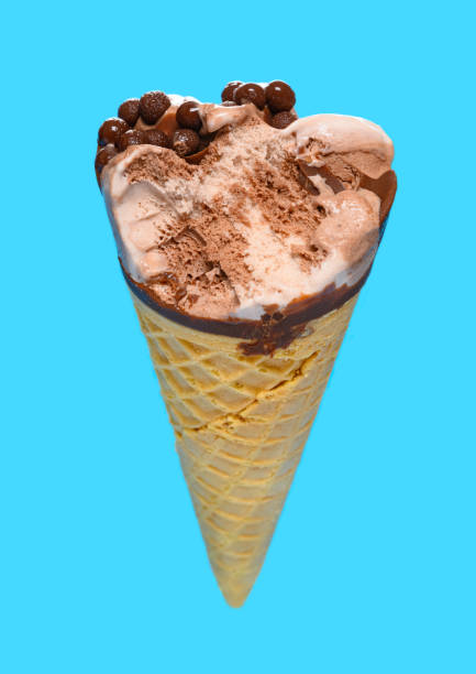 istock angle view chocolate flavor ice cream cone with a bite on a blue background 1221504152