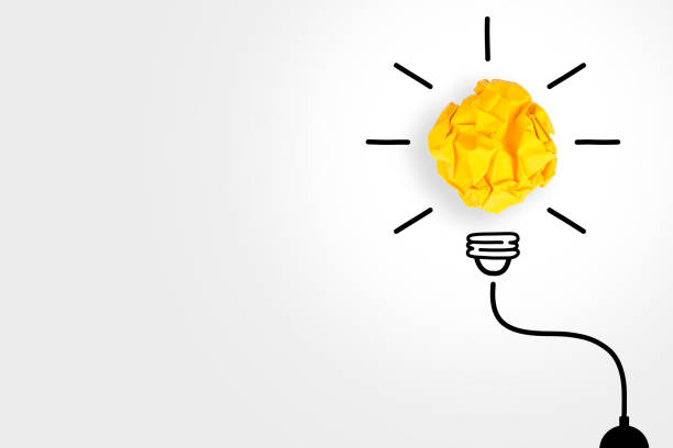istock New Idea Concepts with Light Bulb Crumpled Paper on White Background 1221508090