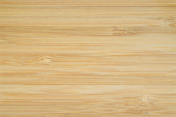 istock Close up of Natural light brown planks bamboo wood texture table background. Abstract surface rough pattern. Design in your work backdrop and decoration. Concept blank copy space for text. 1221510794