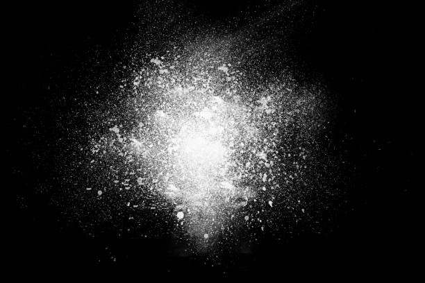 istock Freeze motion of white powder exploding, isolated on black backg 1221512279