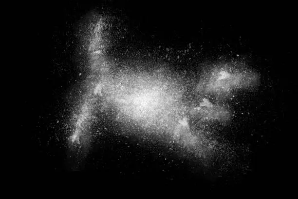 Photo of Freeze motion of white powder exploding on black