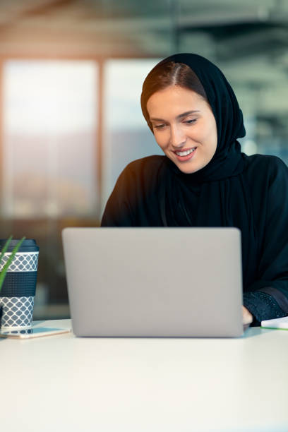 istock professional young muslim business woman using mobile digital tablet computer at work 1221516268