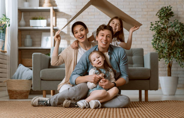 istock Two children with mother and father. 1221516327