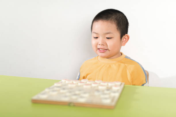 ajedrez chino - outsmart fotografías e imágenes de stock