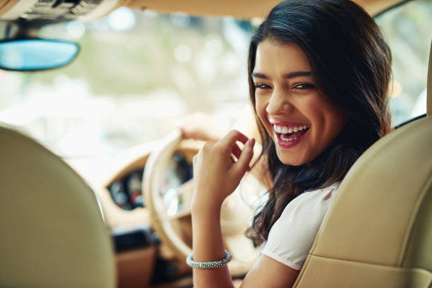 istock Enjoying her new car 1221518475