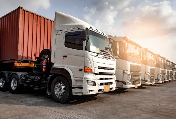 istock Trucks on parking lined up, Road freight industry cargo service, Logistics and transport 1221519469