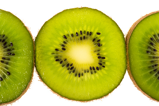 Close up view of fresh red kiwi fruit isolated on white