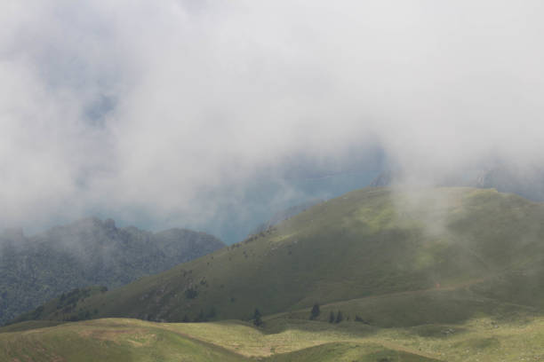 istock Mountain landscape. Thick rainy clouds above mountains. 1221520319