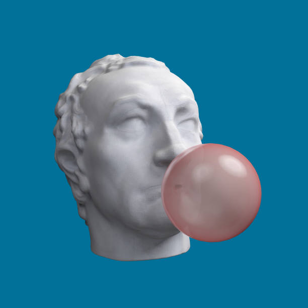 istock Funny illustration from 3d rendering of classical head sculpture blowing a pink chewing gum bubble. Isolated on blue background 1221520486