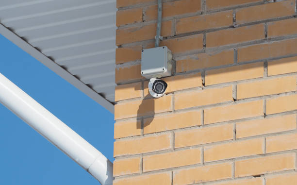 istock CCTV Camera on a brick house. safety concept 1221524411