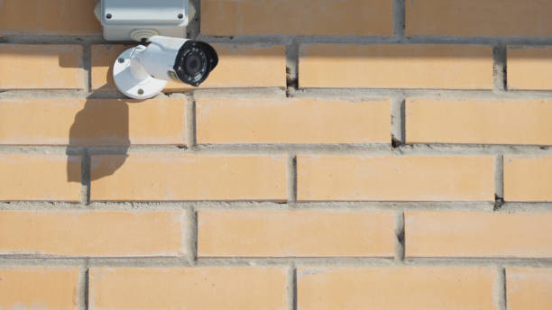 istock CCTV Camera on a brick house. safety concept 1221524420