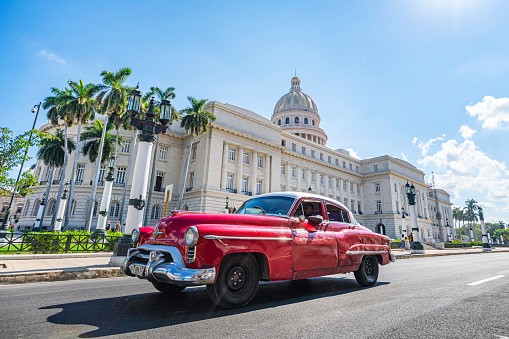 November 26, 2019, Havana, Cuba: Classic american car next to the Capitol building in Old Havana