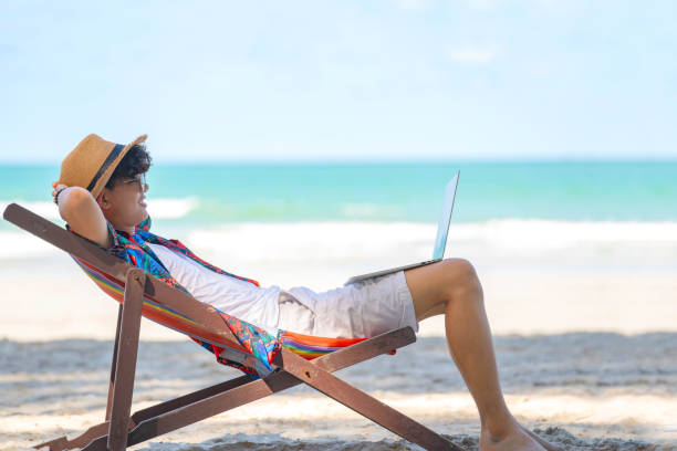 42,500+ Asian Man Relax Beach Stock Photos, Pictures & Royalty-Free ...