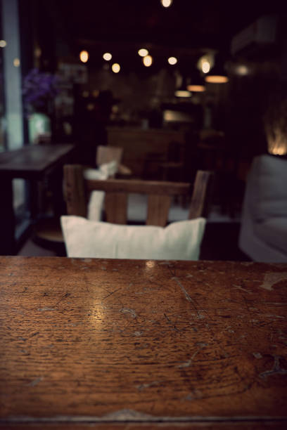 istock Top of empty wood table with Bar Cafe Restaurant blurred background, product display template, Business presentation 1221528466