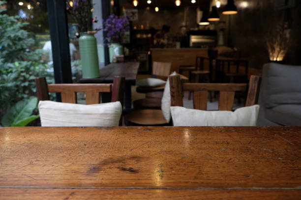 istock Top of empty wood table with Bar Cafe Restaurant blurred background, product display template, Business presentation 1221528467