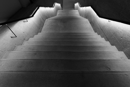 illuminated modern stairway in the dark