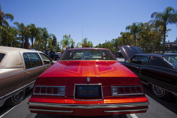 Lowrider Car Show in Santa Ana California. Multiple Lowrider Car Clubs join in a parking lot to display their classic cars.