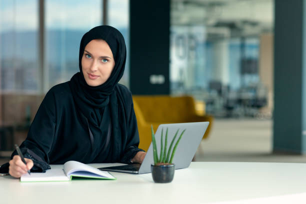 istock professional young muslim business woman using mobile digital tablet computer at work 1221531269